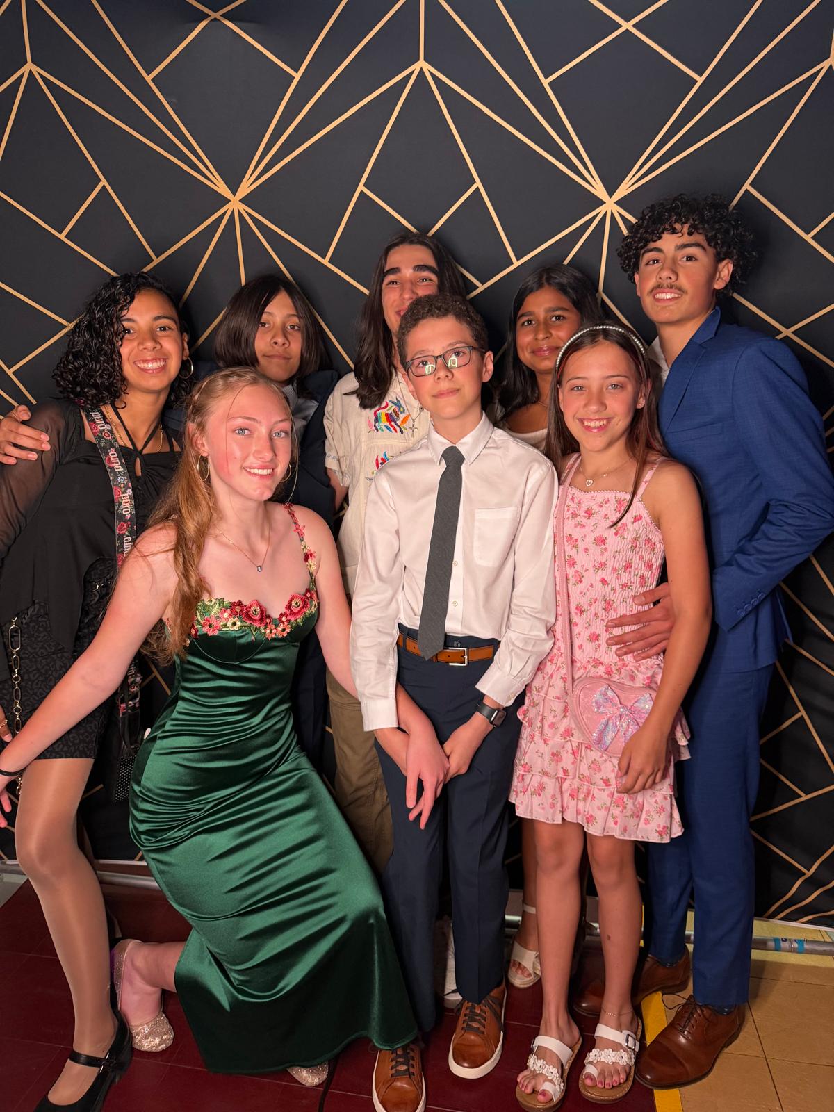 AIA Middle School friends dressed up together at a school dance